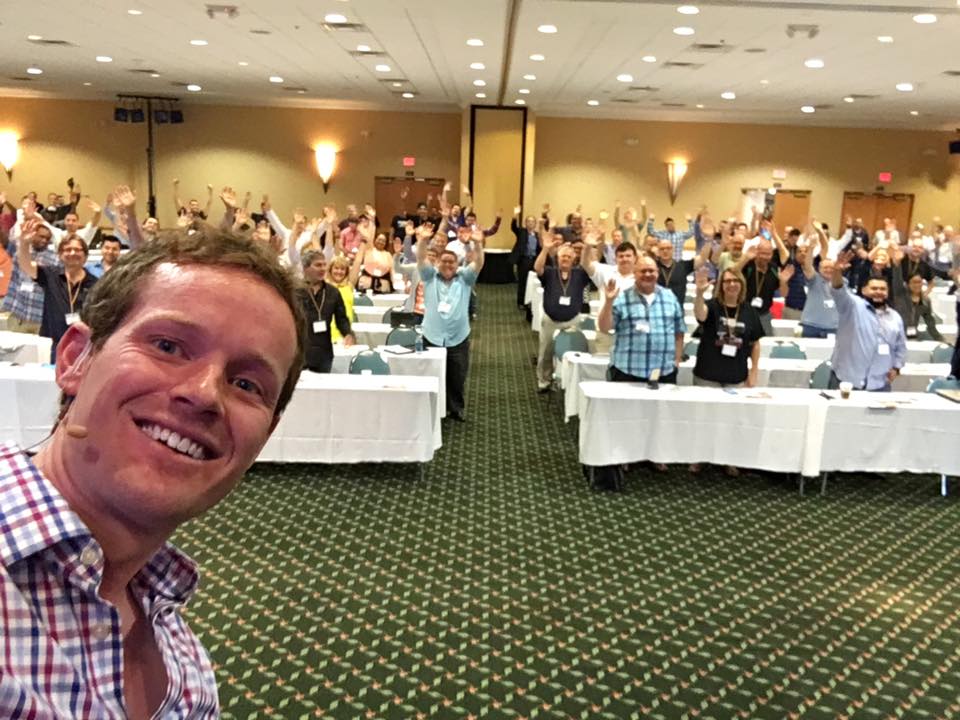 Aidan teaching at live event